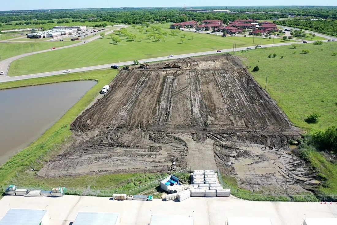 Commercial grading and building pad prepared by Division 31